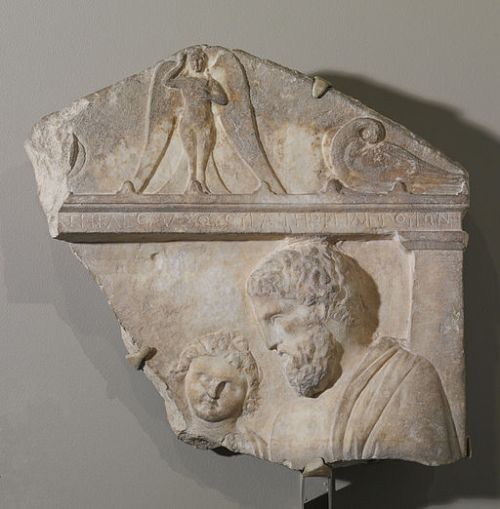 Fragment of a Grave Relief showing mourning dove in the right corner and angel above, circa 350 B.C.. Walters Art Museum, Baltimore, Maryland