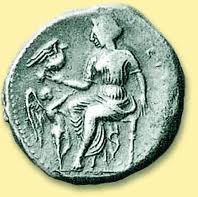 Ancient coin with goddess and dove